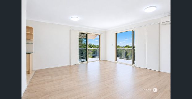 The Largest Apartment in the Complex! Massive Private Balcony Overlooking the Pool - Photo 1