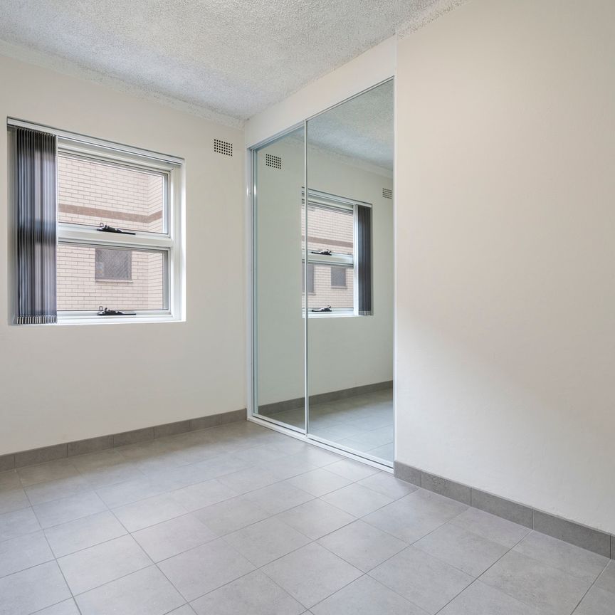 RENOVATED 2 BEDROOM UNITS WITH CAR SPACE - Photo 1