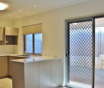 Modern & Low-Maintenance Living in a Convenient Location. - Photo 3