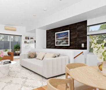 Modern Two-Bedroom Townhouse with Balcony and Secure Garage - Photo 3