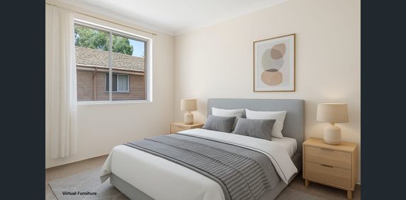 Spacious Two Bedroom Apartment in an Ideal Location - Photo 2