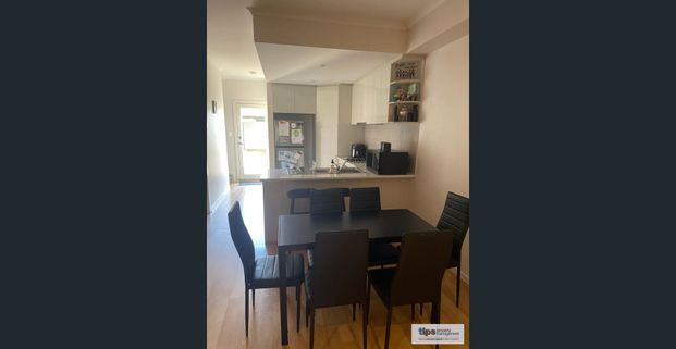 MODERN TOWNHOUSE IN SOUGHT AFTER LOCATION - Photo 1