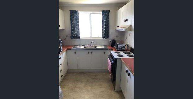 Air-conditioned Renovated Unit Close to Town! - Photo 1