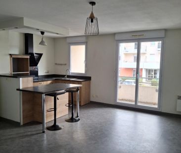 Résidence Les Jardins d'Antan à CUSSET - F2 avec balcon & parking - Photo 1