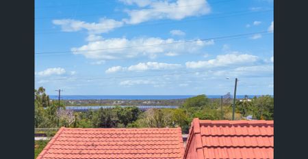 Spacious 3-Bedroom Top Floor Unit with Ocean Views & Character Features - Photo 2