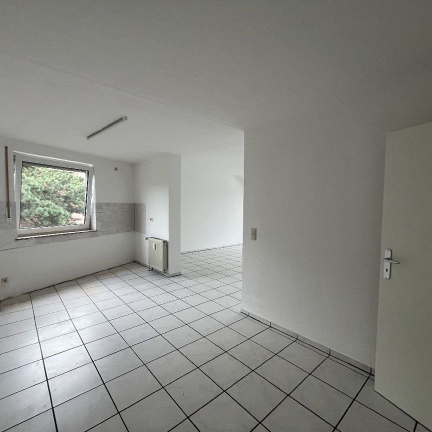 Helle Dachgeschosswohnung mit Balkon, ca. 62,41 m² in Dortmund-Marten zu vermieten! - Foto 1