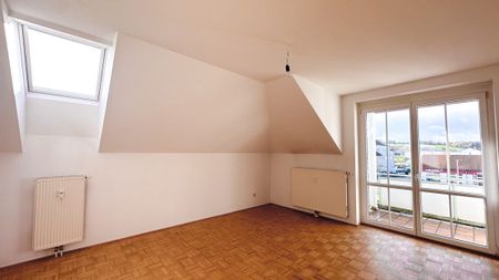 Helle 3-Zimmer-Dachgeschosswohnung mit Loggia - Foto 3