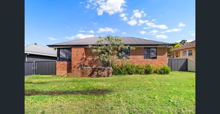 FOUR BEDROOM SPACIOUS HOME WITH CARPORT - Photo 3