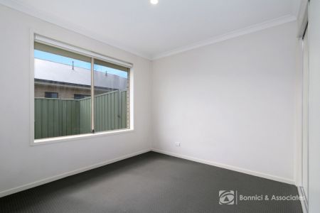 COMFORTABLE TWO-BEDROOM HOME WITH SECURE PRIVATE YARD - Photo 2