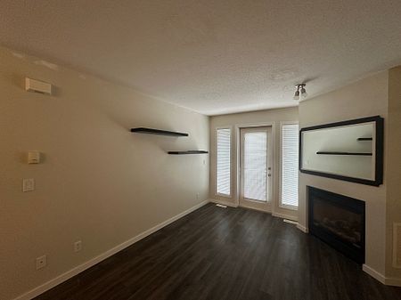 Stylish 1 Bedroom + Den Condo in Sylvan Lake – Steps from Lakeshore Dr - Photo 2