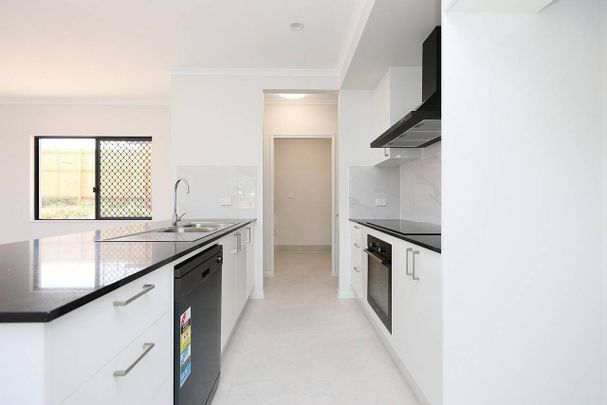 Brand New - Fully A/C and Tiled - Solar - Side Access - New Turf Coming Soon - Photo 1