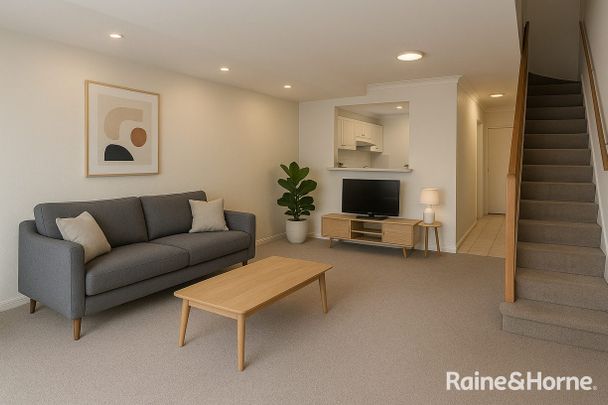 Spacious Three-Bedroom Townhouse - Photo 1