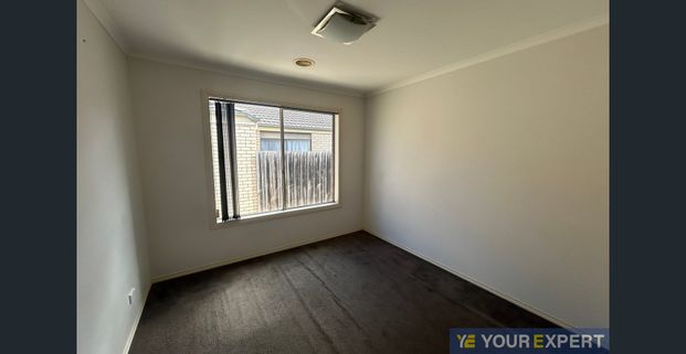 Generous 4-Bedroom Home Perfect for Families - Photo 1