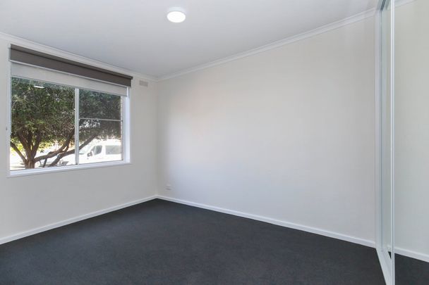 TWO BEDROOM UNIT CLOSE TO THE ACTION! - Photo 1
