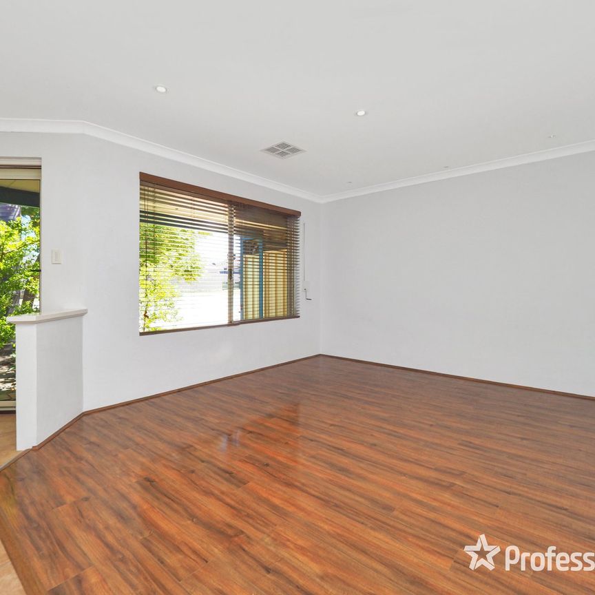 Centrally Located Family Haven ! - Photo 1