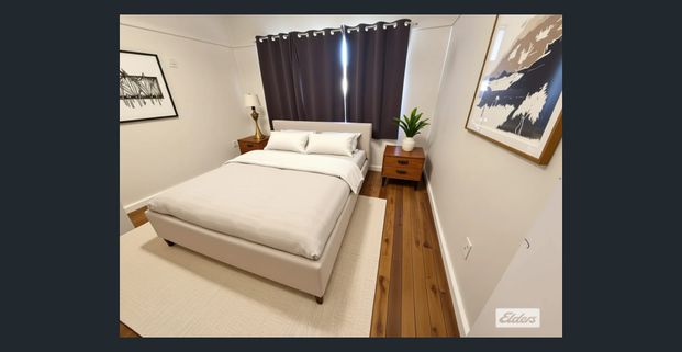 Beautifully Updated Home Close to All Essentials - Photo 1