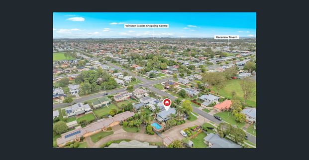 Charming Family Home with Poolside Living in the Heart of Raceview - Photo 1