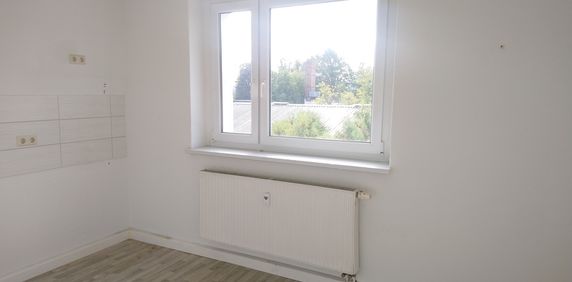 Schöne 2-Zimmer Dachgeschosswohnung - Foto 2