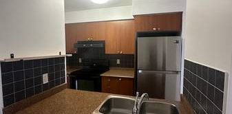 2-Bedroom + Den Condo in The Junction – Available - Photo 2