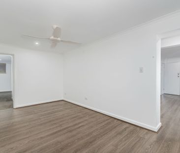 Spacious Two-Bedroom Unit in Sought-After The Hill Location - Photo 2