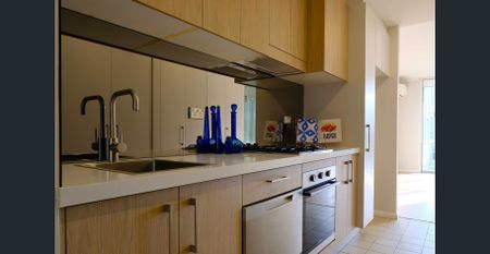 Stylish Apartment with Resort-Style Facilities in the Heart of Waterloo - Photo 3