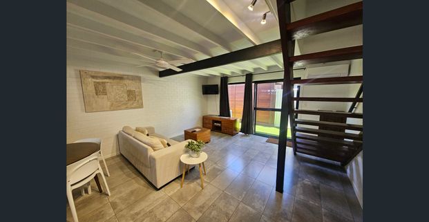 Partially Furnished Unit with a Resort Style Feel on Miller Street at Bargara! - Photo 1