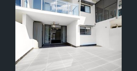 Modern Unit with Huge Patio & Pool Views – Prime Belgian Gardens Location - Photo 4