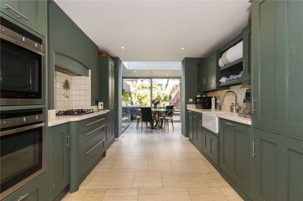 Stunning three bedroom terraced house refurbished to an excellent standard throughout. - Photo 1