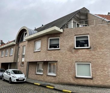 GELIJKVLOERSAPPARTEMENT MET TERRAS EN GARAGE IN HET CENTRUM VAN TIELT. - Photo 4