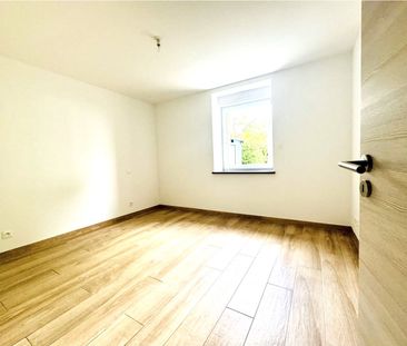 Location Appartement 4 pièces 90m² HAUCOURT MOULAINE 54860 - Photo 6