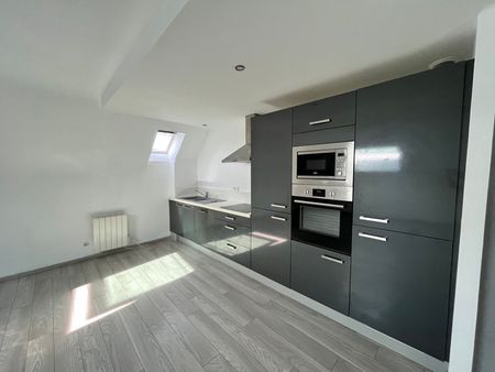 Appartement à louer - Photo 2