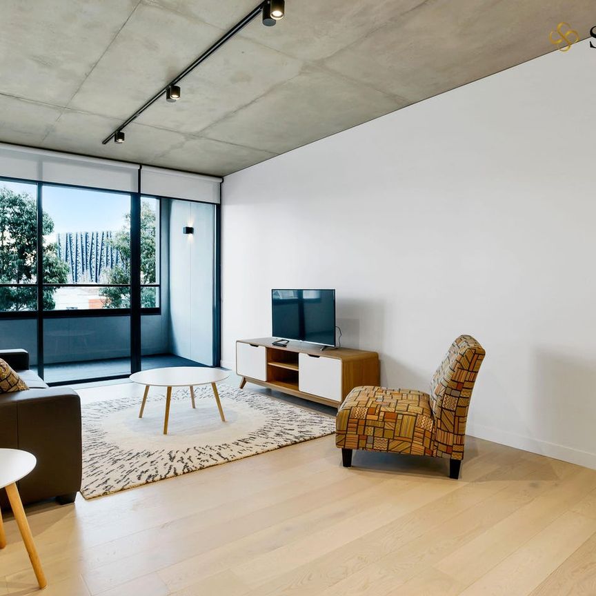 Stylish 1-Bedroom Apartment in the Heart of North Melbourne - Photo 1