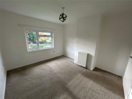 A three-bedroom semi-detached cottage located in the village of Llangedwyn. - Photo 4