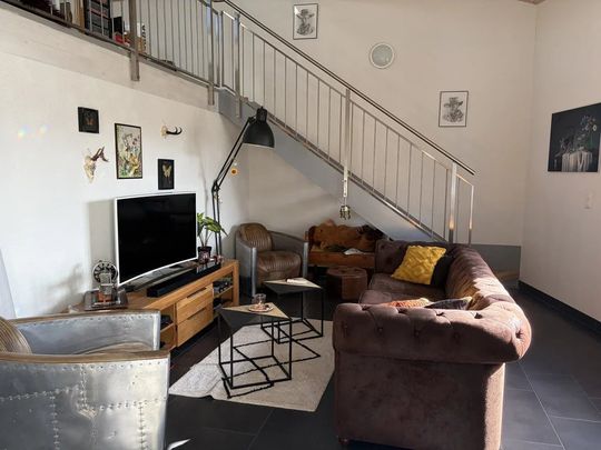 Appartement de 3,5 pièces en duplex au 4ème étage avec balcon et vue sur jardin et montagnes. - Photo 1