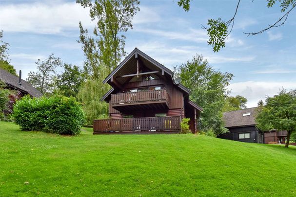 A beautifully presented two bedroom lodge, located in the picturesque setting of the Harleyford Estate and offered fully furnished - Photo 1