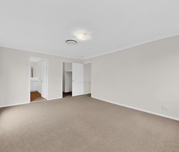 Spacious 5-Bedroom Family Home with Ducted Air and Media Room - Photo 1