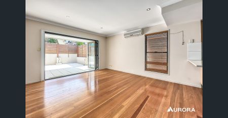 Dual Level Townhouse in Fantastic Location! - Photo 2