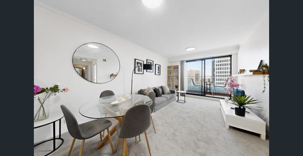 Furnished Modern One Bedroom in Heart of City - Photo 1