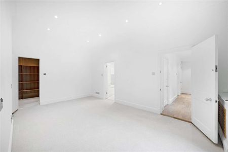 A two bedroom apartment that offers a wonderful high ceilinged reception room as well as a contemporary styled kitchen. - Photo 4