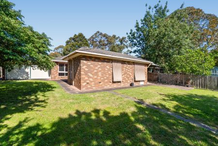 Spacious Four-Bedroom Home with Gardening Included - Photo 5