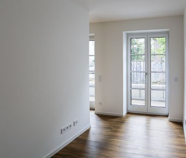 Charmante 1,5-Zimmer-Wohnung im Erdgeschoss des beliebten Endhauses... - Photo 2