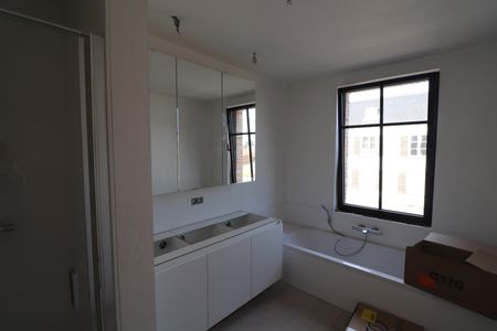 Energiezuinige nieuwbouwwoning met 3 slaapkamers, terras met tuin, tuinberging, carport en autostaanplaats. - Foto 3