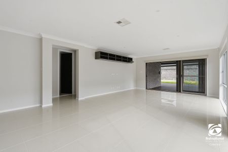 Spacious Family Home with Multiple Living Areas - Photo 4