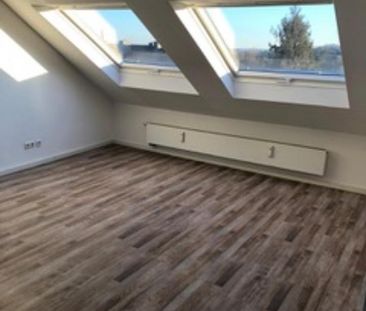 Charmante Dachgeschosswohnung - Photo 1