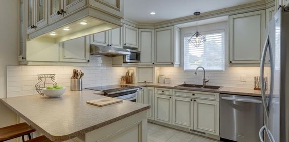 5 1/2 avec jardin privé et 3 stationnements - Photo 2