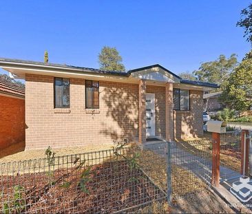 Comfortable and Low Maintenance Free Standing 2 Bedroom Home - Photo 3