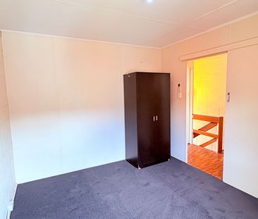 Two-storey, two-bedroom unit - Photo 2