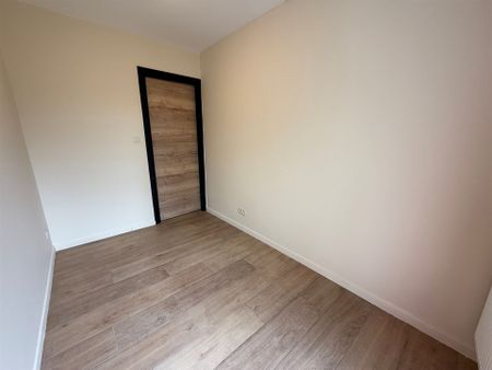 Gelijkvloersappartement met tuin en 2 slaapkamers! - Photo 2