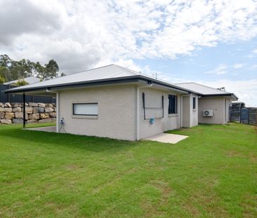 MODERN FOUR BEDROOM HOME IN THE HEART OF RIVERSTONE RISE - Photo 5