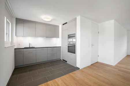 Moderne Wohnung an urbaner Lage und exklusiver Dachterrasse - Photo 3